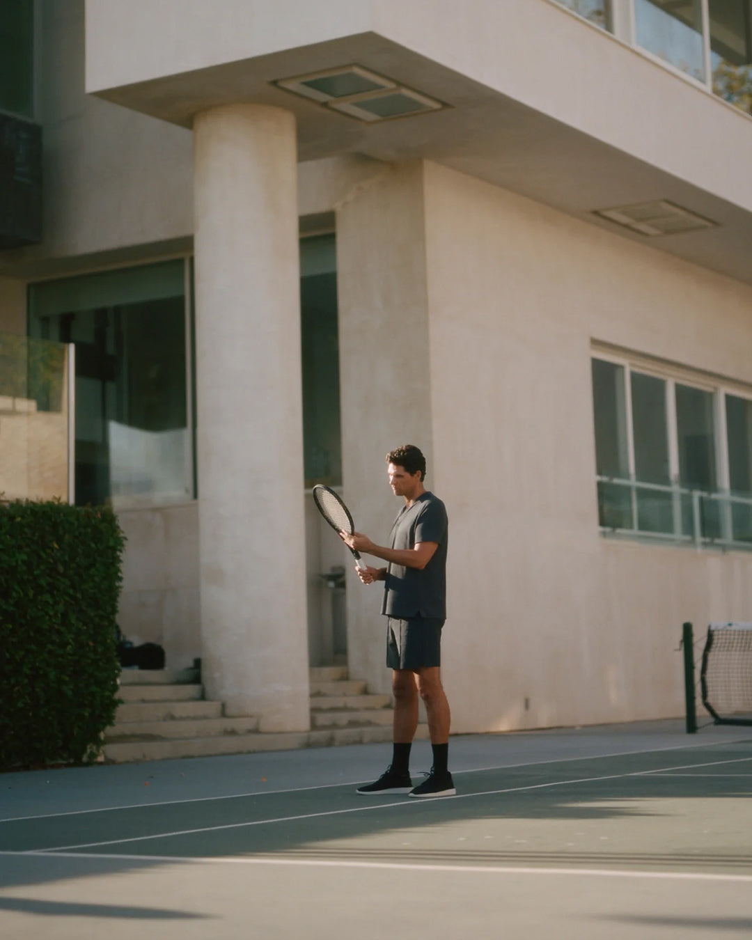 Mark Philippoussi on an abstract tennis court