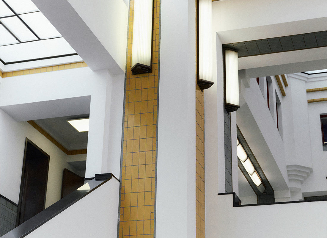 Interior detail of Kunstmuseum Den Haag – modernist lines and lighting, part of The ACE Hub visual identity