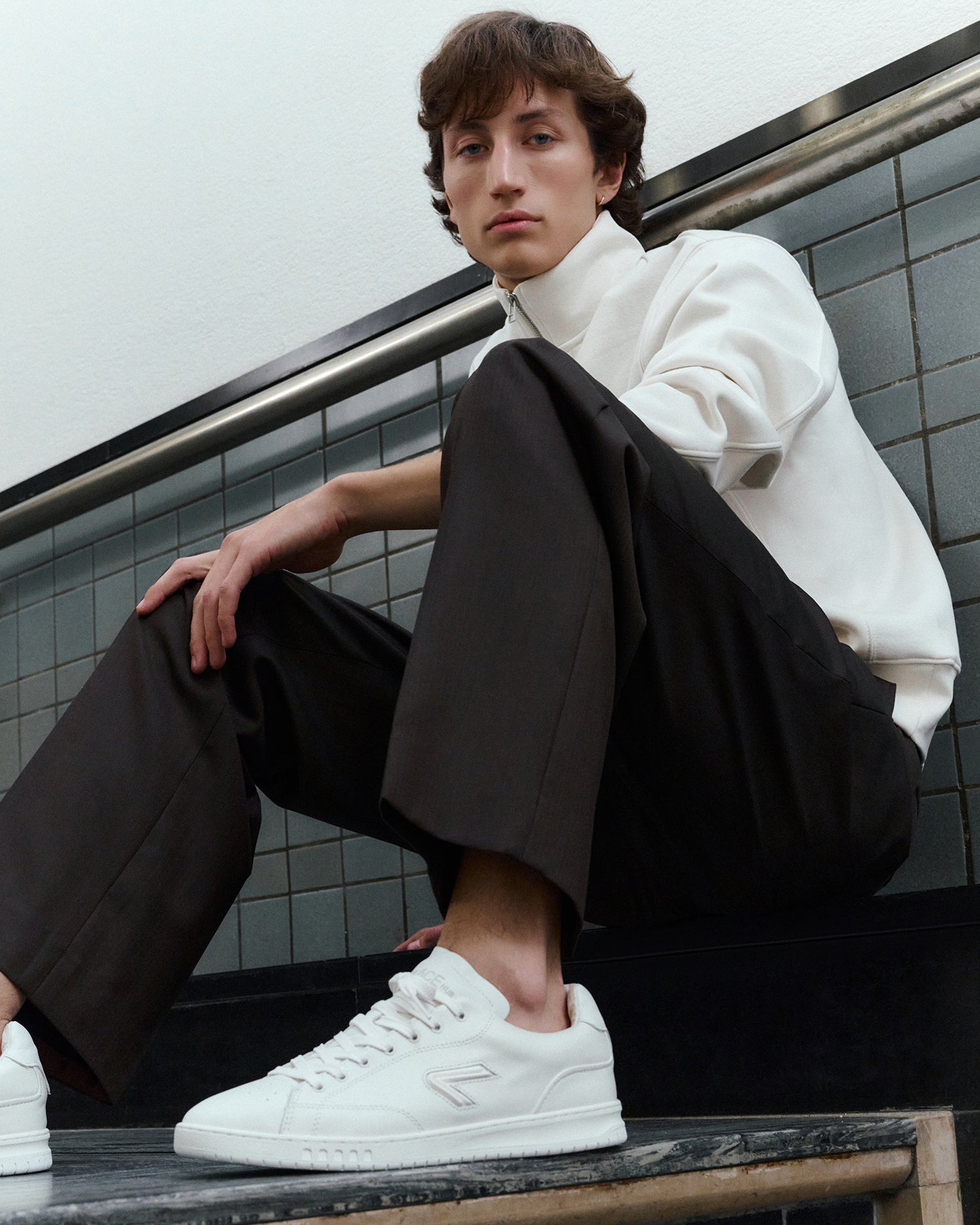 The ACE Hub Shot sneaker in off-white, photographed at Kunstmuseum Den Haag


