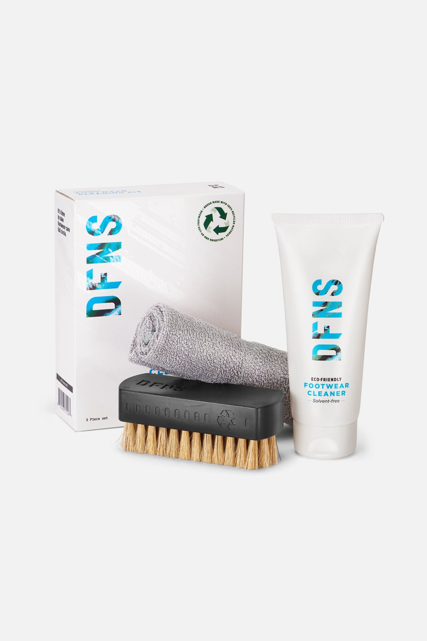 DFNS Footwear Cleaning Kit with brush, cloth and cleaner on white background