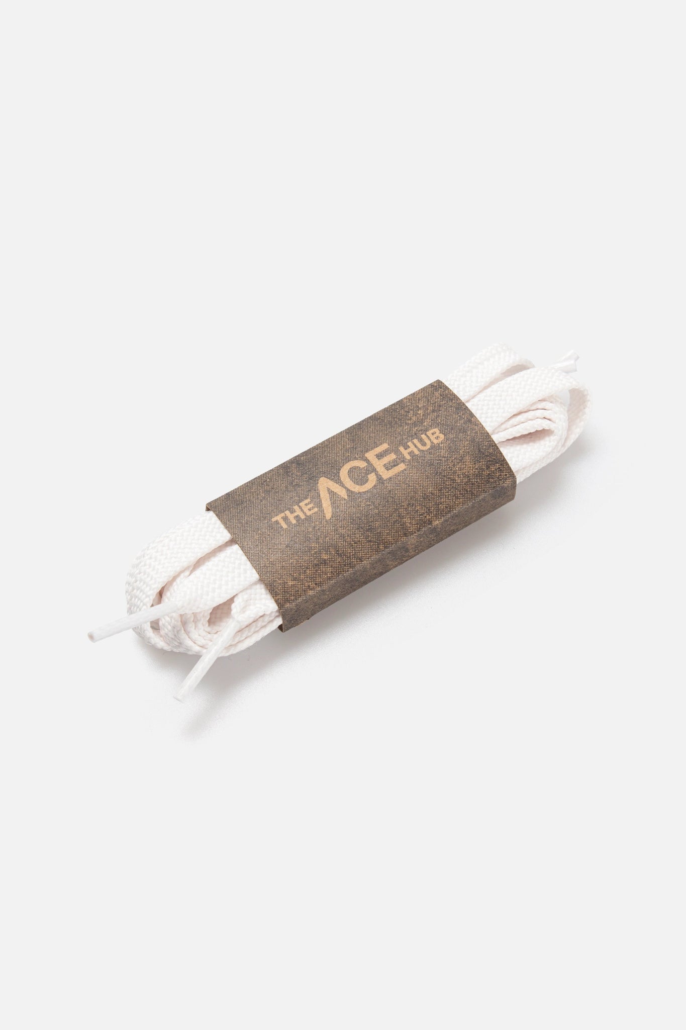 Fluffy off-white laces by The ACE Hub, rolled and wrapped in branded paper